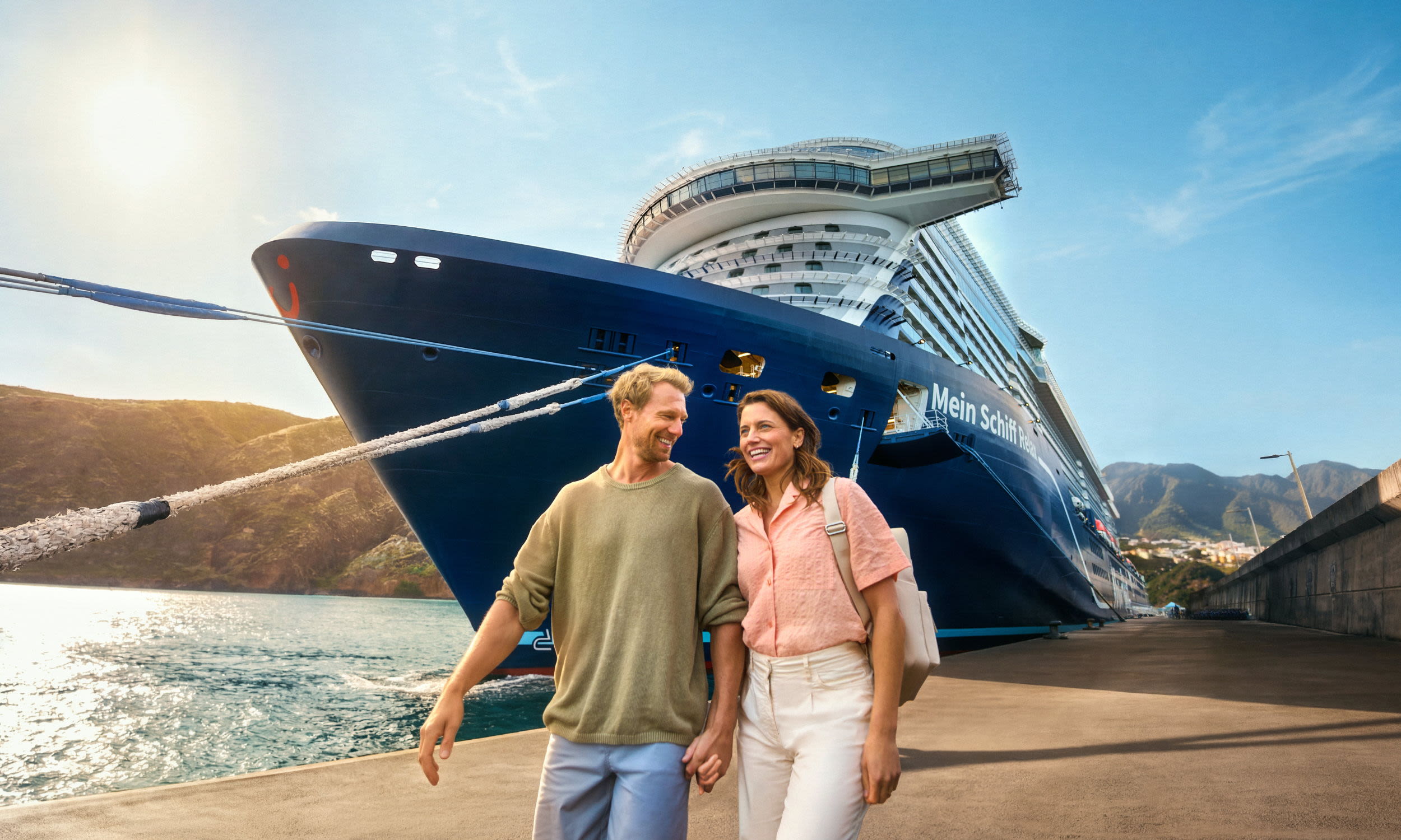 Couple walks hand in hand along the ship Couple walks hand in hand along the ship