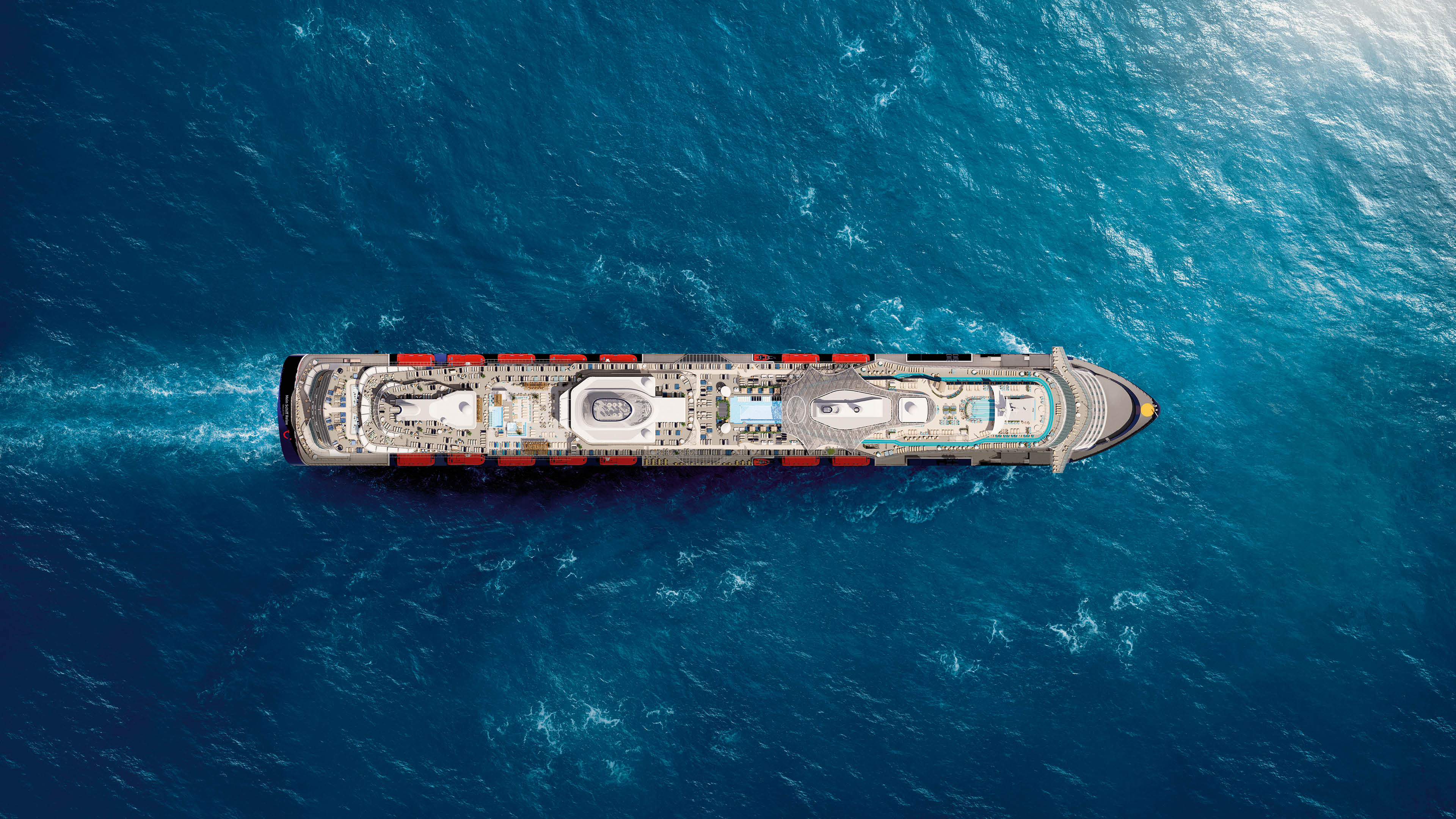 Kreuzfahrtschiff der Mein Schiff® Flotte auf blauem Meer von oben.